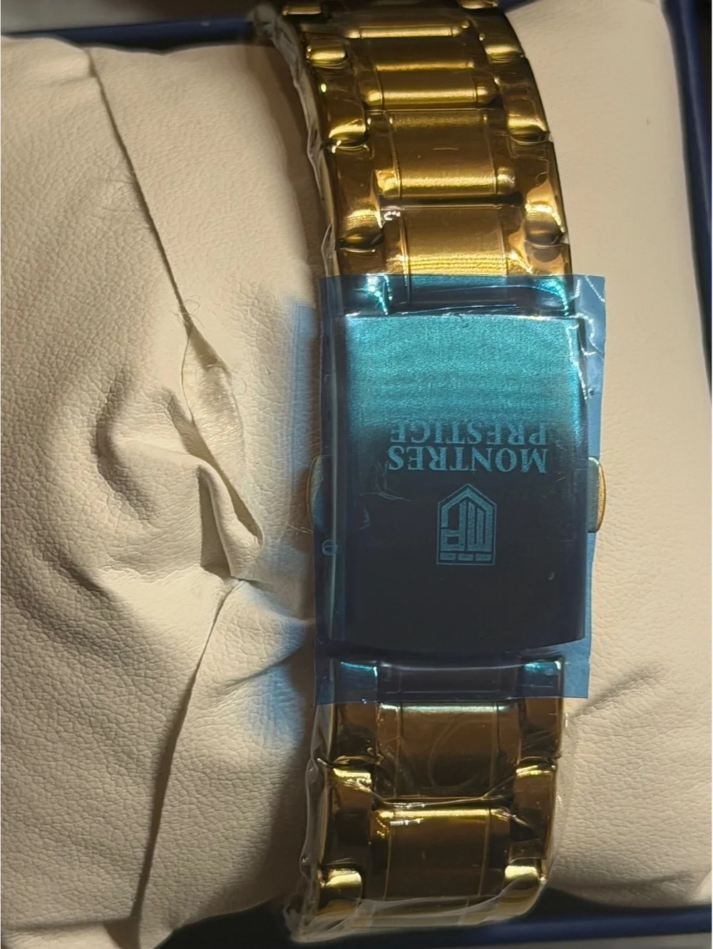 Montres Prestige gold-tone watch with moonphase dial
